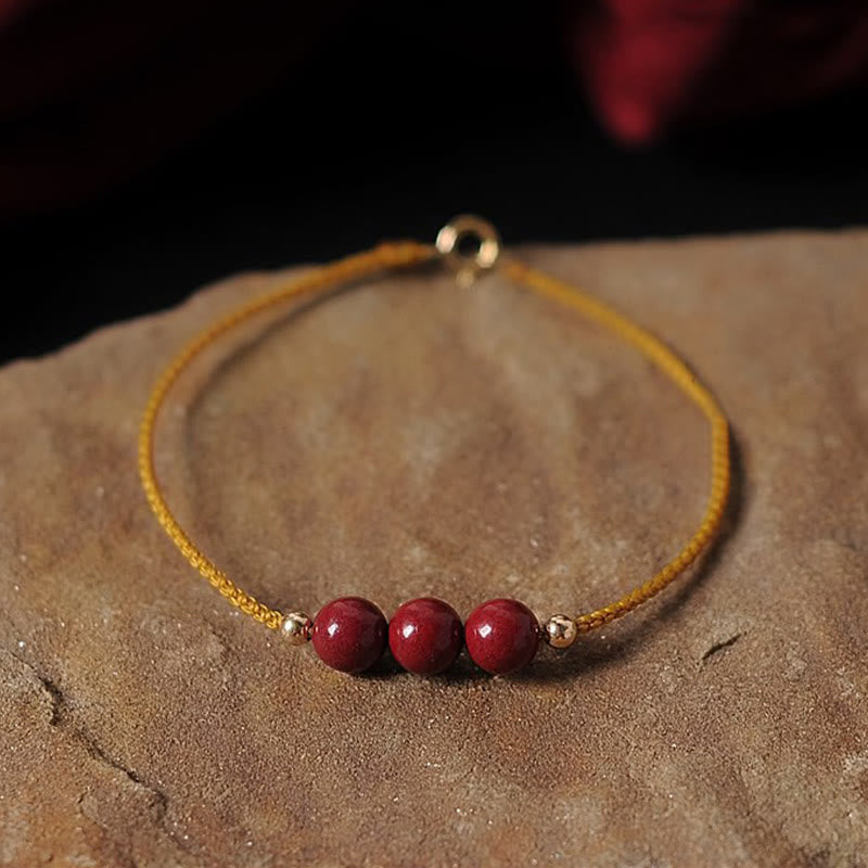 Bracelet tressé en cinabre naturel plaqué or 14 carats de Buddha Stones
