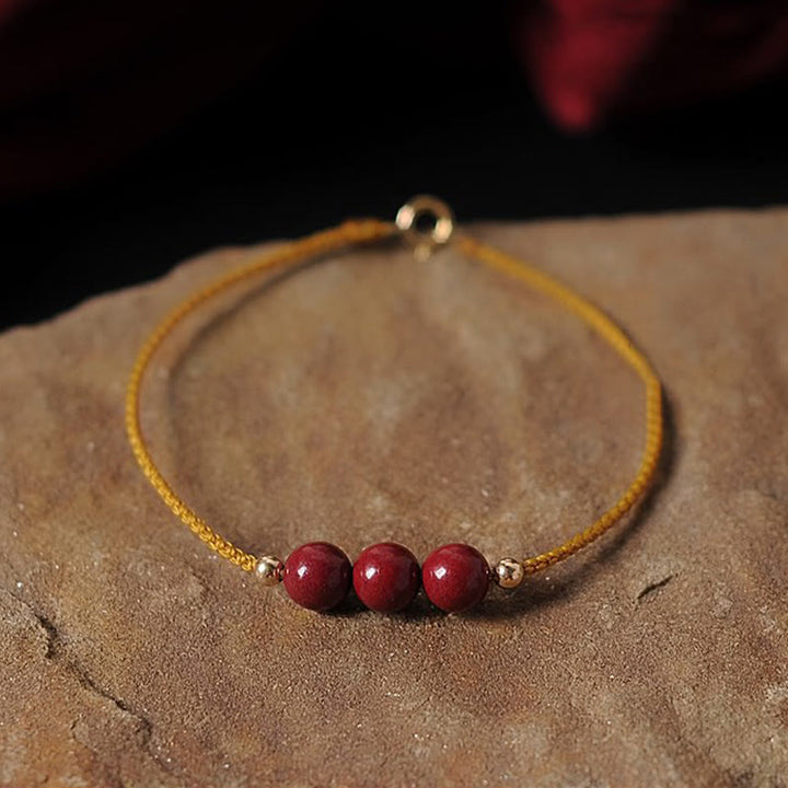 Bracelet tressé en cinabre naturel plaqué or 14 carats de Buddha Stones