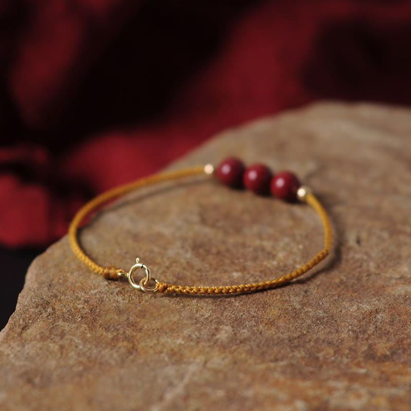 Bracelet tressé en cinabre naturel plaqué or 14 carats de Buddha Stones