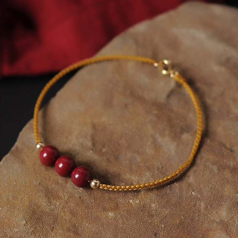 Bracelet tressé en cinabre naturel plaqué or 14 carats de Buddha Stones