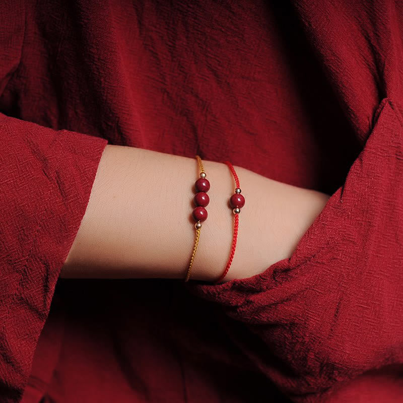 Bracelet tressé en cinabre naturel plaqué or 14 carats de Buddha Stones