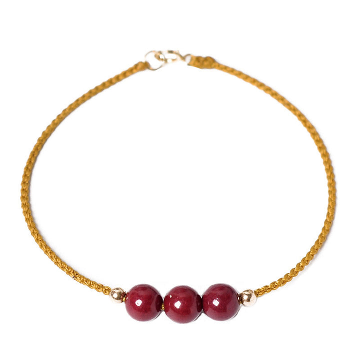 Bracelet tressé en cinabre naturel plaqué or 14 carats de Buddha Stones