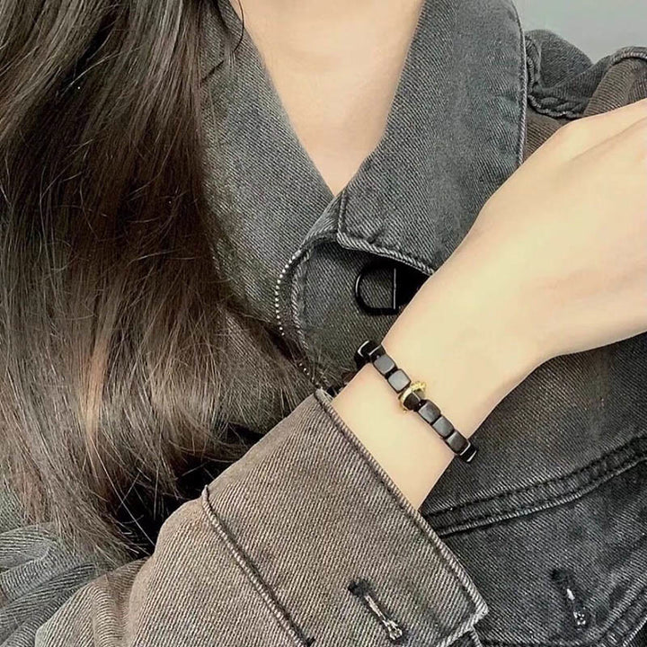 Bracelet de perles carrées en bois d'ébène tibétain Buddha Stones Peace Calm