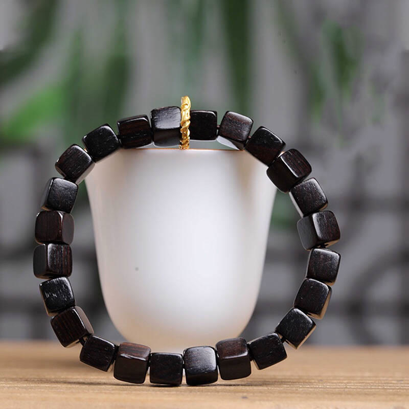 Bracelet de perles carrées en bois d'ébène tibétain Buddha Stones Peace Calm