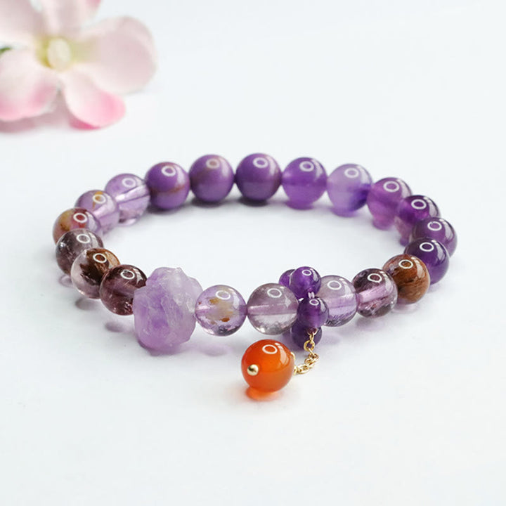 Bracelet de conscience spirituelle en pierres précieuses naturelles d'améthyste violette fantôme de Buddha Stones