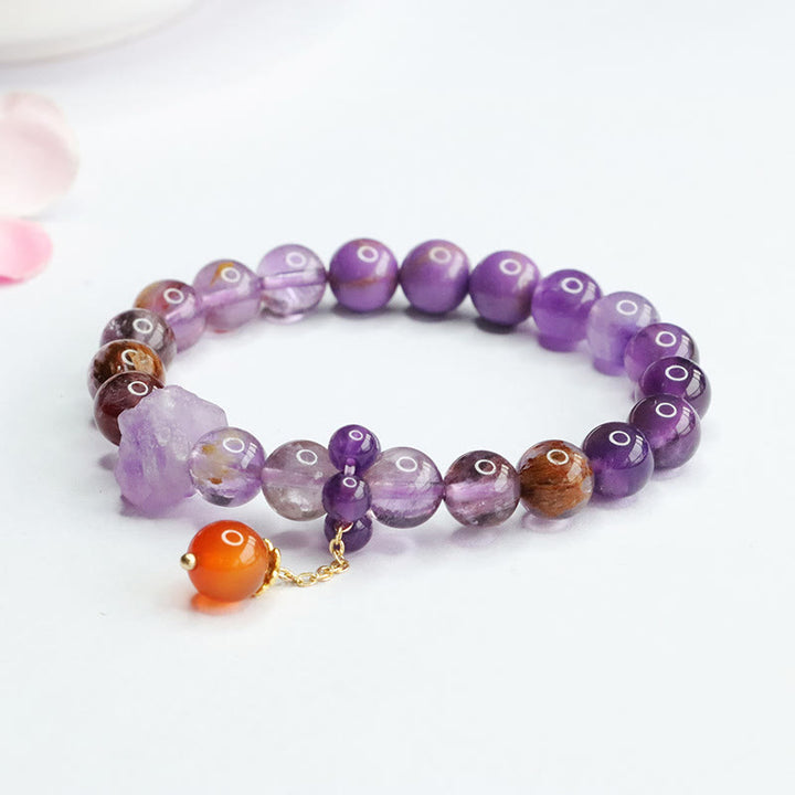 Bracelet de conscience spirituelle en pierres précieuses naturelles d'améthyste violette fantôme de Buddha Stones