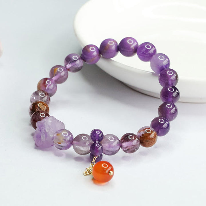 Bracelet de conscience spirituelle en pierres précieuses naturelles d'améthyste violette fantôme de Buddha Stones