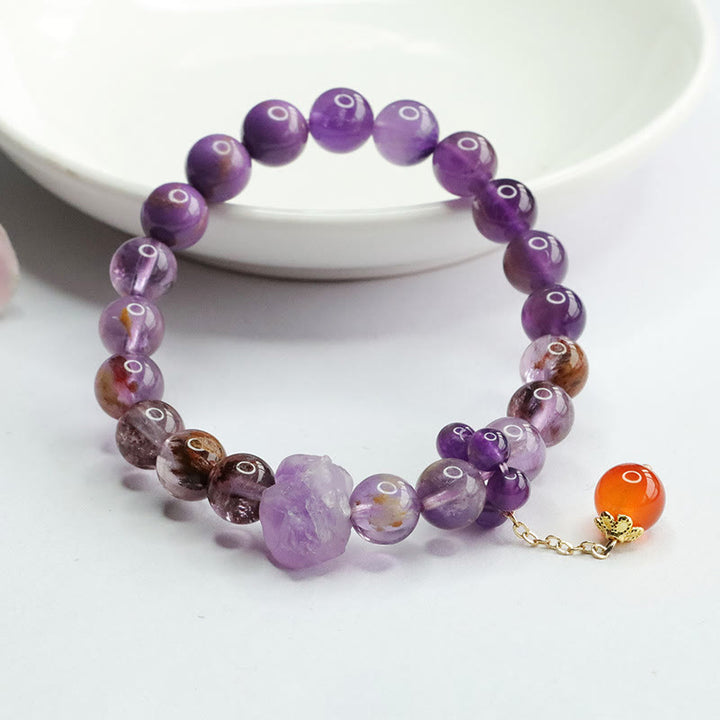 Bracelet de conscience spirituelle en pierres précieuses naturelles d'améthyste violette fantôme de Buddha Stones
