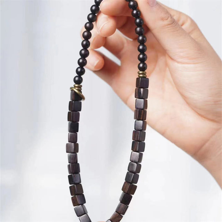 Bracelet double tour en perles carrées en bois d'ébène du Tibet et Buddha Stones