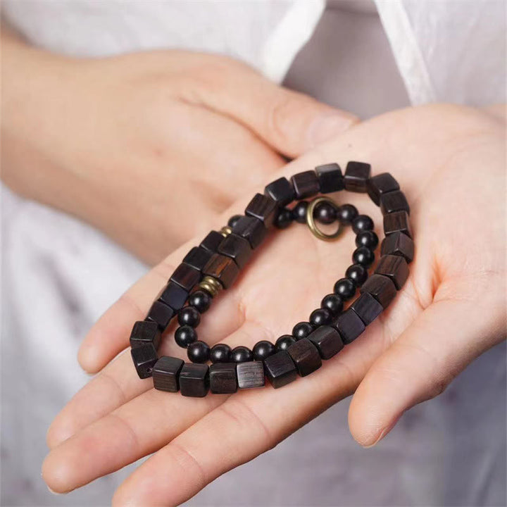 Bracelet double tour en perles carrées en bois d'ébène du Tibet et Buddha Stones
