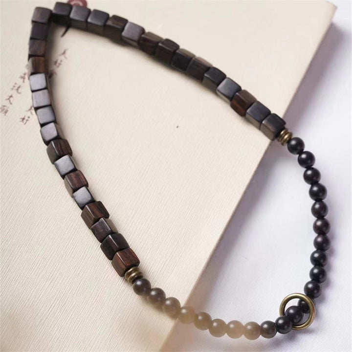 Bracelet double tour en perles carrées en bois d'ébène du Tibet et Buddha Stones