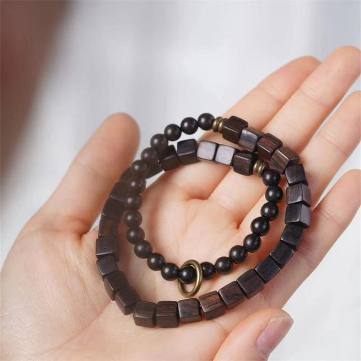 Bracelet double tour en perles carrées en bois d'ébène du Tibet et Buddha Stones