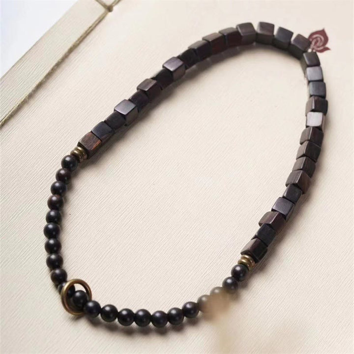 Bracelet double tour en perles carrées en bois d'ébène du Tibet et Buddha Stones