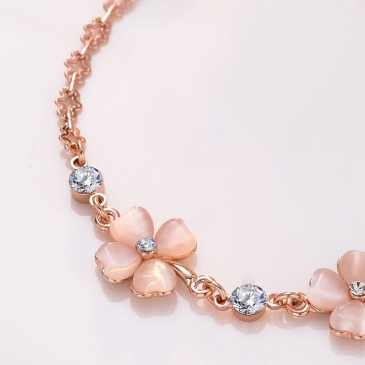 Bracelet chaîne d'amour en cristal rose avec trèfle à quatre feuilles et Buddha Stones
