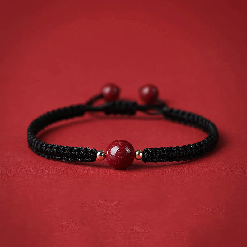 Bracelet porte-bonheur en perles de cinabre avec cordon rouge et Buddha Stones