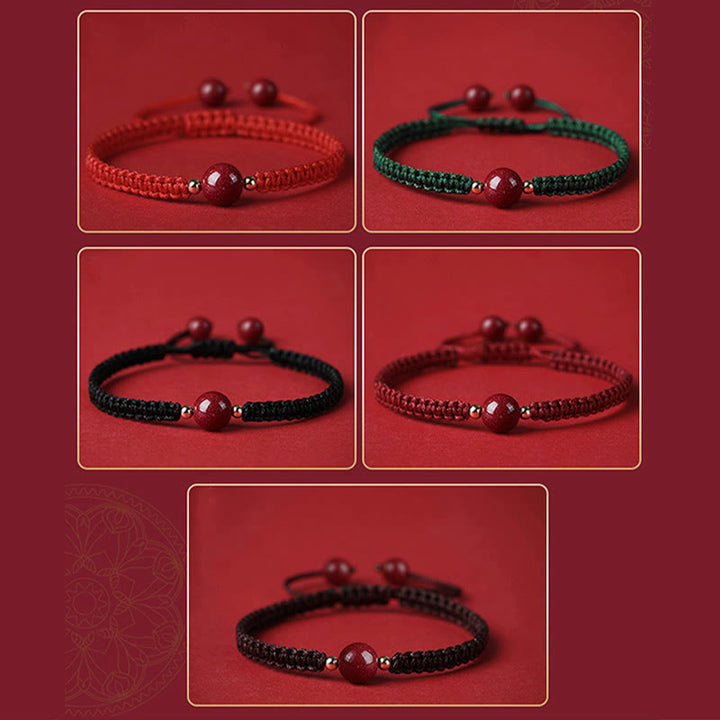 Bracelet porte-bonheur en perles de cinabre avec cordon rouge et Buddha Stones