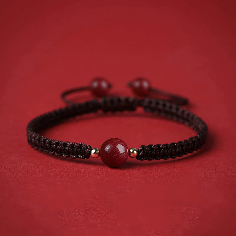 Bracelet porte-bonheur en perles de cinabre avec cordon rouge et Buddha Stones