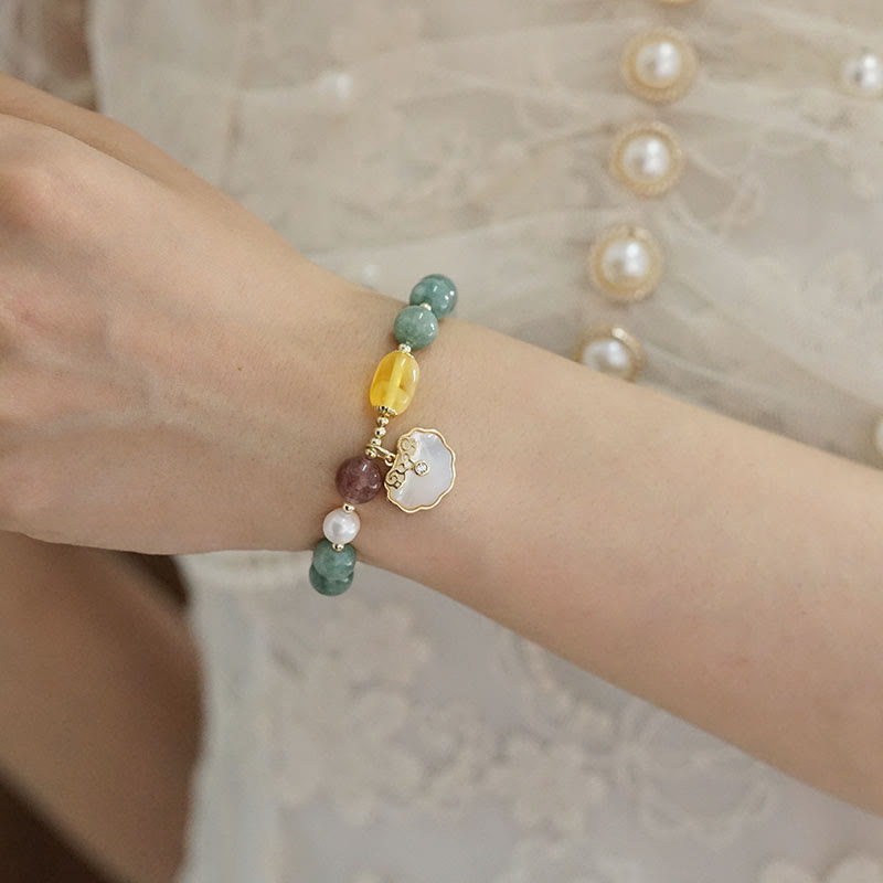 Bracelet porte-bonheur en jade et coquillages de Buddha Stones Ruyi