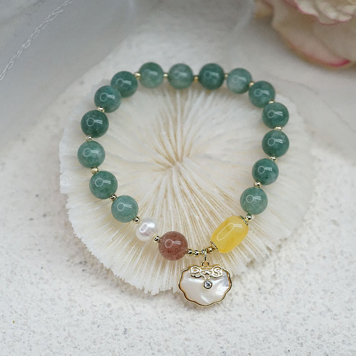 Bracelet porte-bonheur en jade et coquillages de Buddha Stones Ruyi