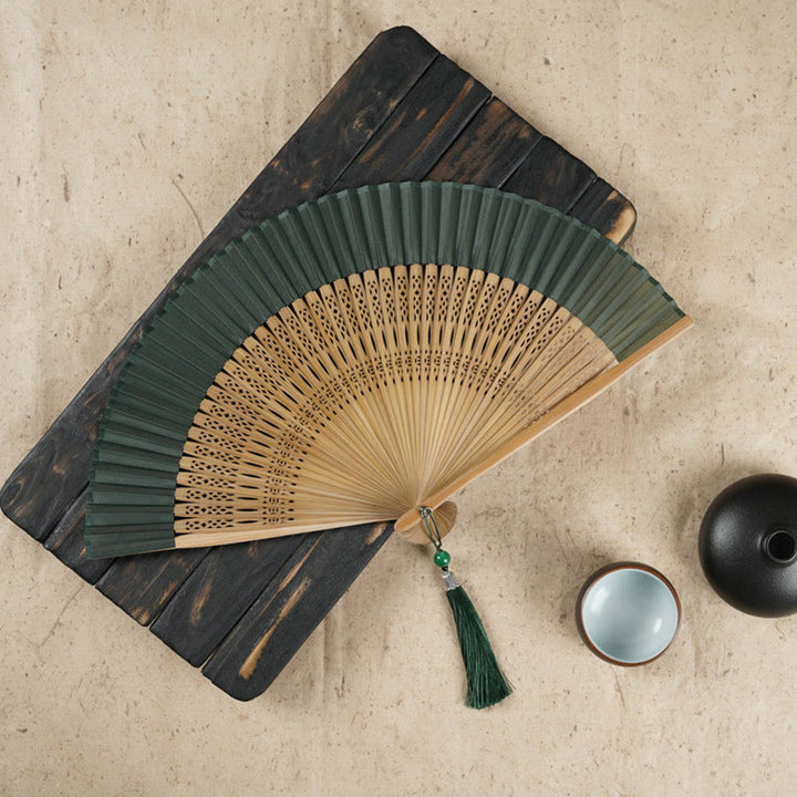 Éventail pliable en bambou à main avec gravure simple et creuse en forme de fleur de cerisier avec Buddha Stones - Vert armée 22 cm - image 5