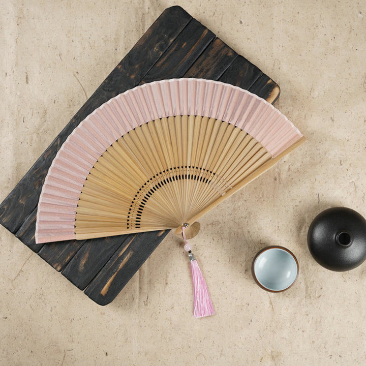 Éventail pliable en bambou à main avec gravure simple et creuse en forme de fleur de cerisier avec Buddha Stones - Rose 22 cm - image 3