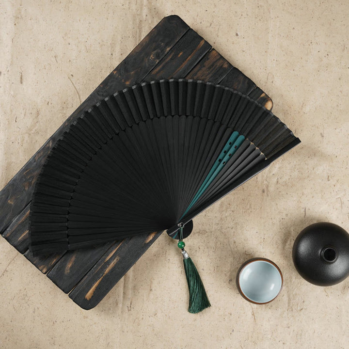 Éventail pliable en bambou à main avec gravure simple et creuse en forme de fleur de cerisier avec Buddha Stones - Noir 22 cm - image 9