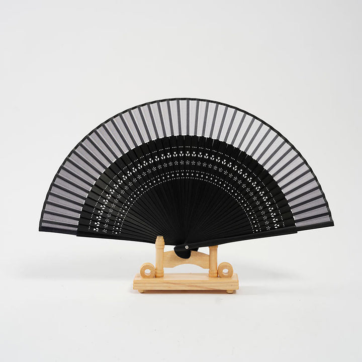 Éventail pliable en bambou à main avec gravure creuse et dégradé de couleurs de Buddha Stones