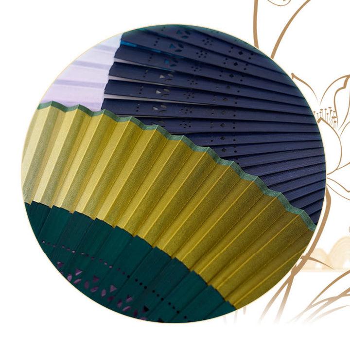 Éventail pliable en bambou à main avec gravure creuse et dégradé de couleurs de Buddha Stones