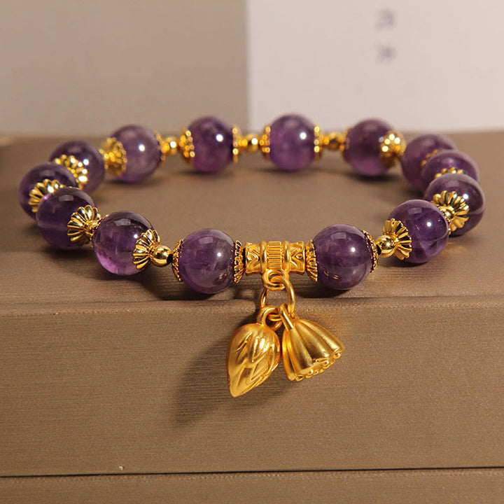Bracelet spirituel de guérison en améthyste naturelle et lotus en Buddha Stones