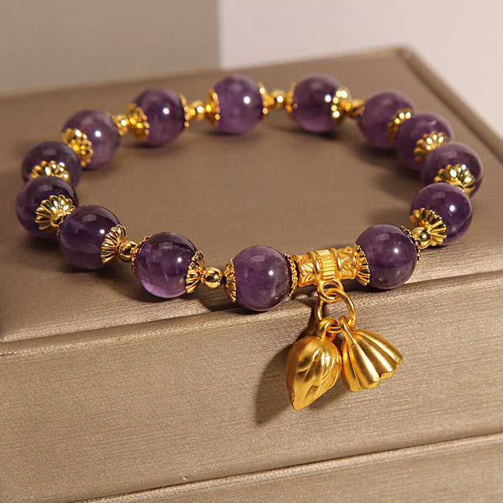 Bracelet spirituel de guérison en améthyste naturelle et lotus en Buddha Stones