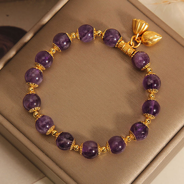 Bracelet spirituel de guérison en améthyste naturelle et lotus en Buddha Stones