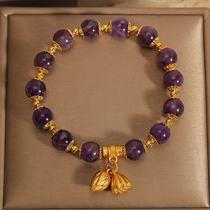 Bracelet spirituel de guérison en améthyste naturelle et lotus en Buddha Stones