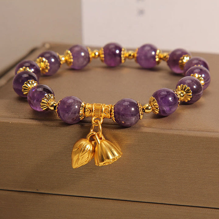 Bracelet spirituel de guérison en améthyste naturelle et lotus en Buddha Stones