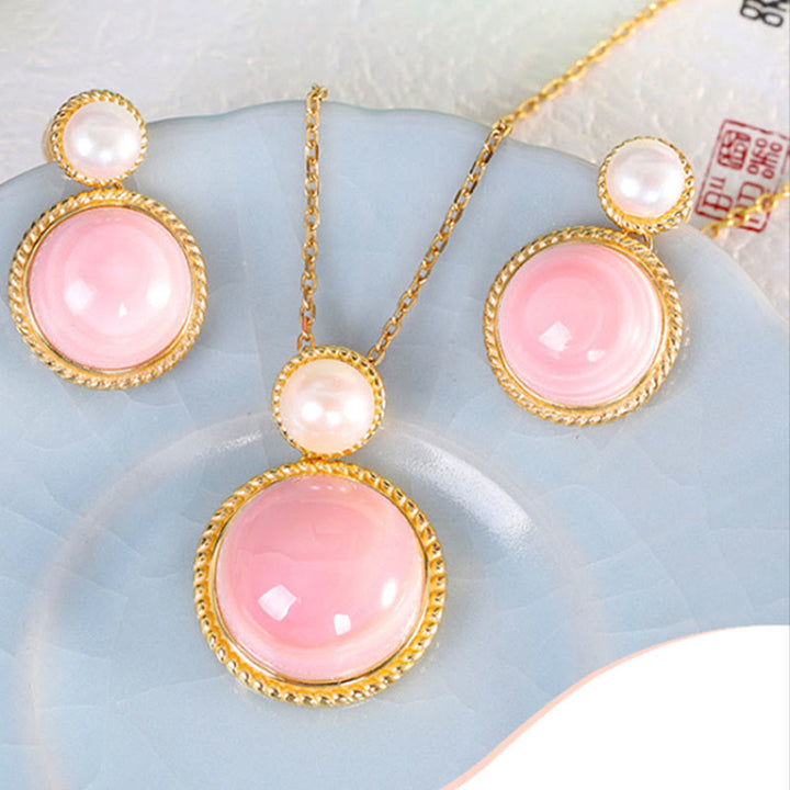 Ensemble de bijoux avec boucles d'oreilles, collier et pendentif en argent sterling 925 avec perles de coquillage de la Buddha Stones