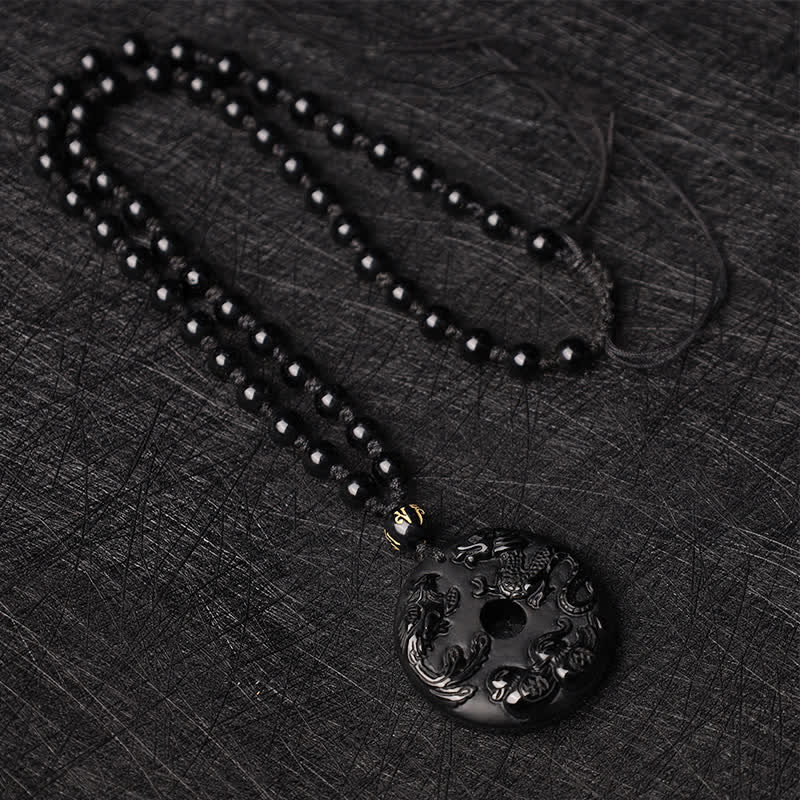 Collier pendentif protection chance canard mandarin dragon phénix obsidienne noire Buddha Stones