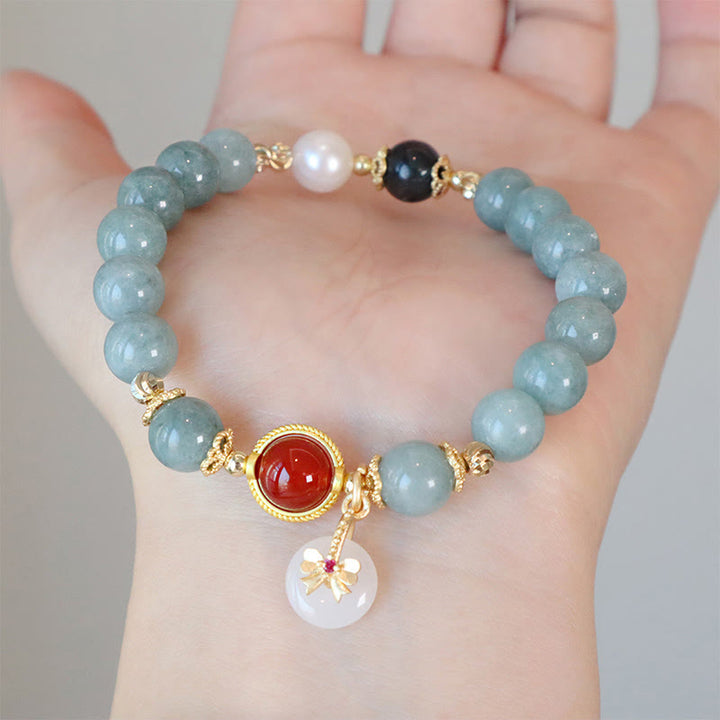 Bracelet porte-bonheur en perles d'agate rouge et jade naturel de Buddha Stones