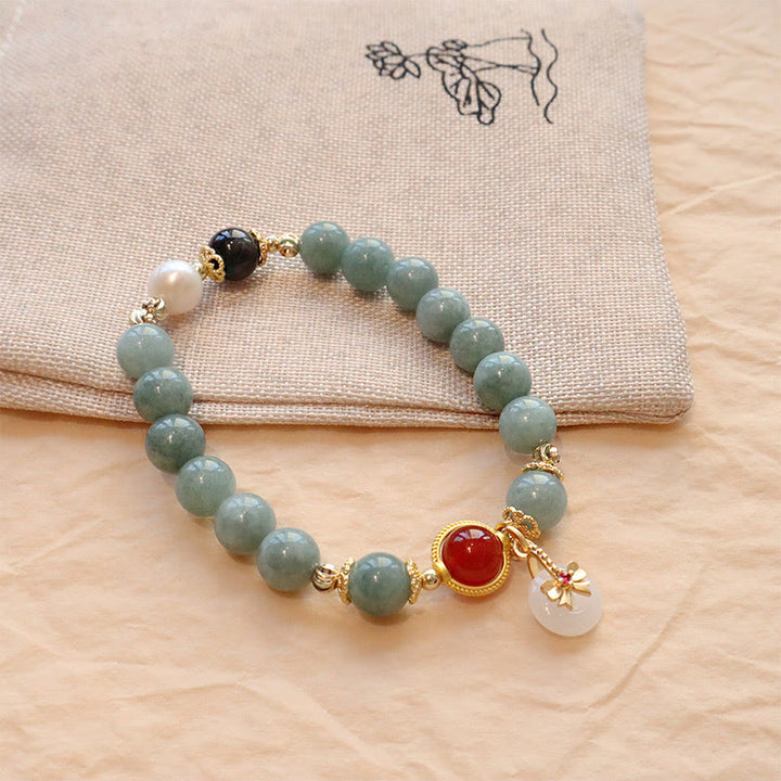 Bracelet porte-bonheur en perles d'agate rouge et jade naturel de Buddha Stones