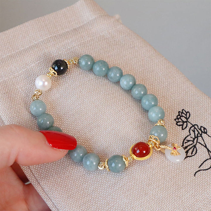Bracelet porte-bonheur en perles d'agate rouge et jade naturel de Buddha Stones