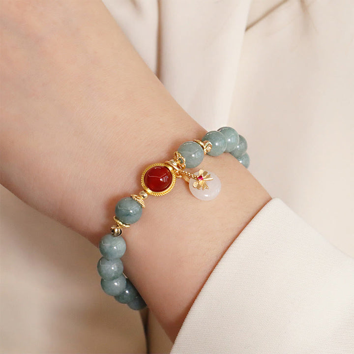 Bracelet porte-bonheur en perles d'agate rouge et jade naturel de Buddha Stones