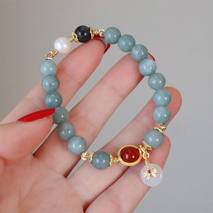 Bracelet porte-bonheur en perles d'agate rouge et jade naturel de Buddha Stones