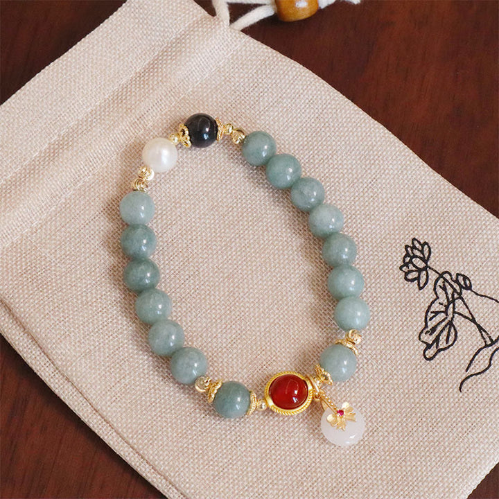 Bracelet porte-bonheur en perles d'agate rouge et jade naturel de Buddha Stones