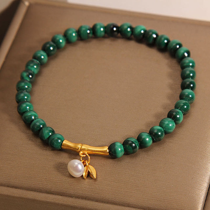Bracelet anti-anxiété en bambou porte-bonheur avec perles de malachite naturelle et Buddha Stones