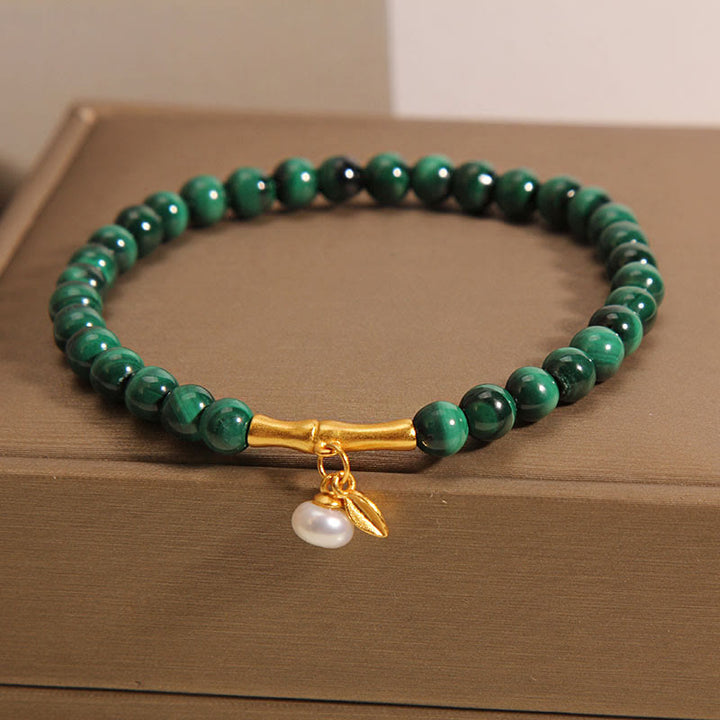 Bracelet anti-anxiété en bambou porte-bonheur avec perles de malachite naturelle et Buddha Stones