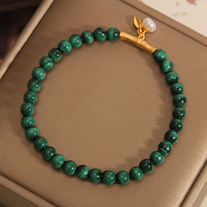 Bracelet anti-anxiété en bambou porte-bonheur avec perles de malachite naturelle et Buddha Stones
