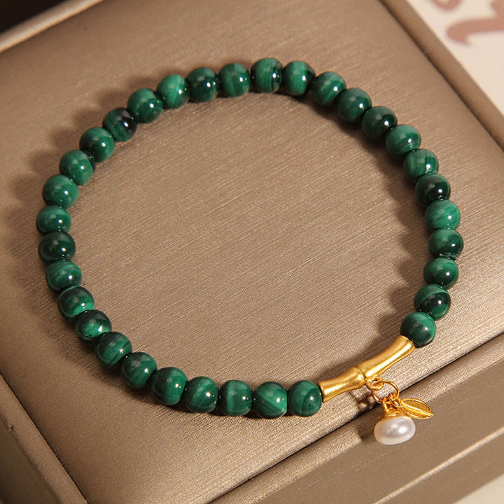 Bracelet anti-anxiété en bambou porte-bonheur avec perles de malachite naturelle et Buddha Stones