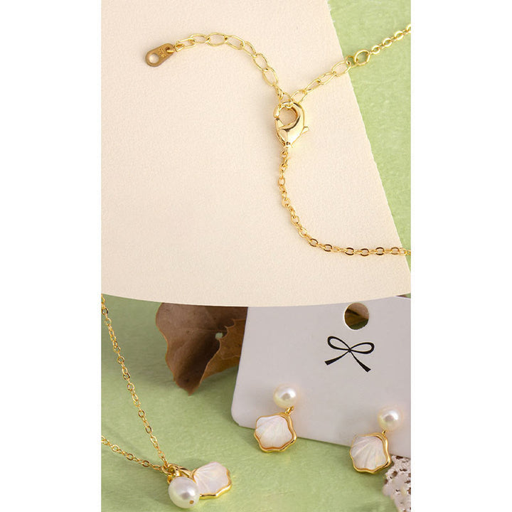 Ensemble de boucles d'oreilles, collier, pendentif, bague et perles en cuivre avec Buddha Stones Ginkgo Tridacna