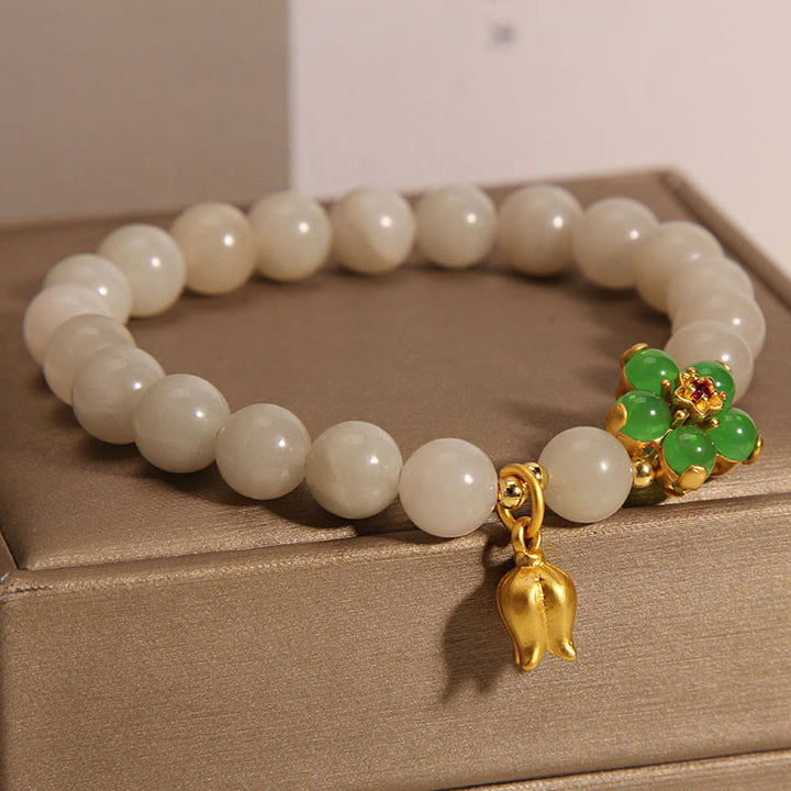 Bracelet porte-bonheur en jade vert naturel et fleur de muguet avec Buddha Stones