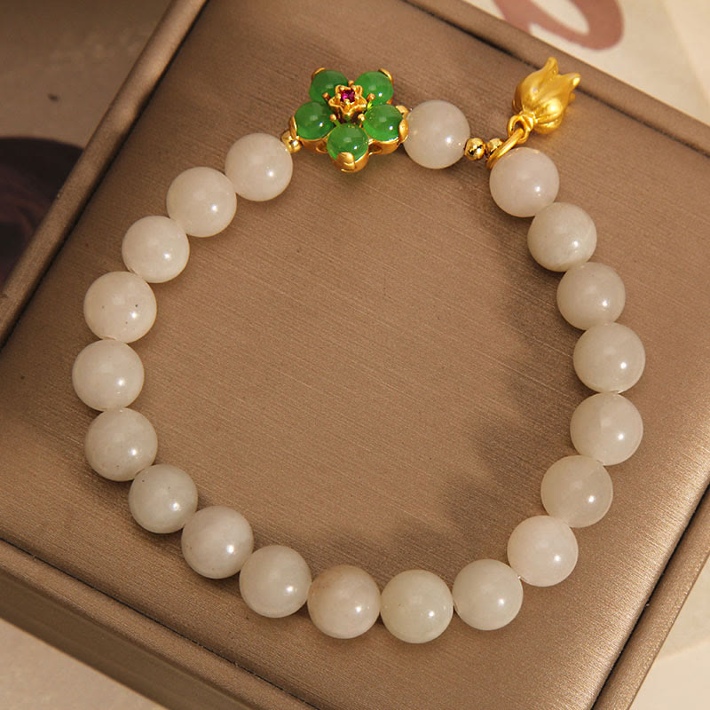 Bracelet porte-bonheur en jade vert naturel et fleur de muguet avec Buddha Stones