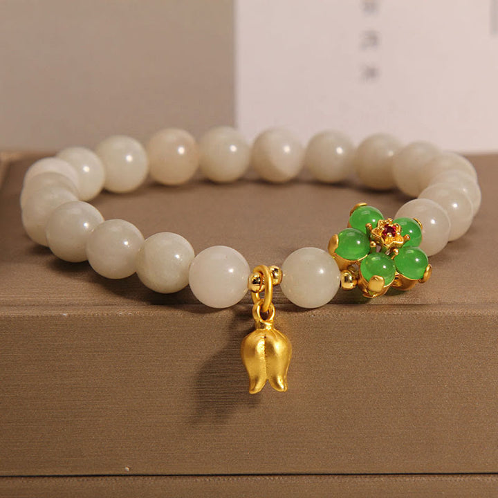 Bracelet porte-bonheur en jade vert naturel et fleur de muguet avec Buddha Stones