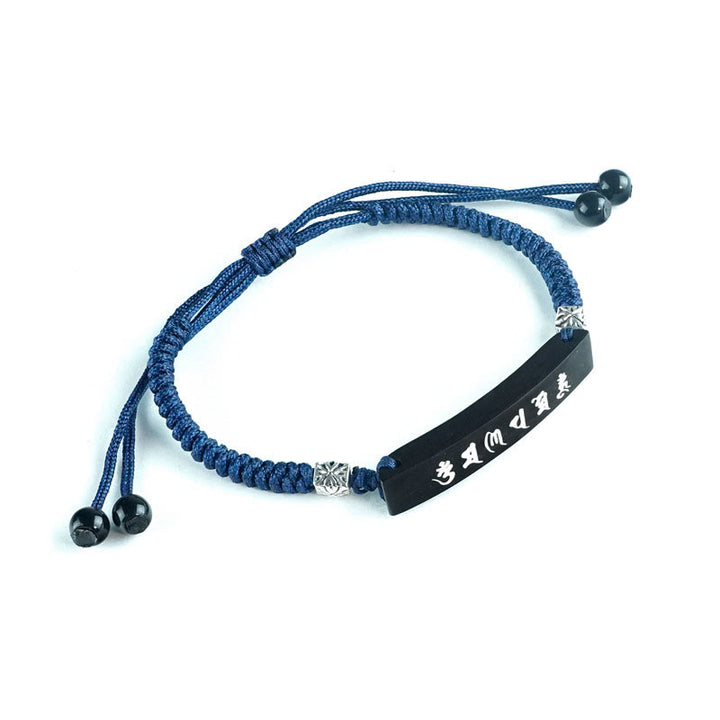 Bracelet de protection incrusté d'argent en bois d'ébène et de Buddha Stones